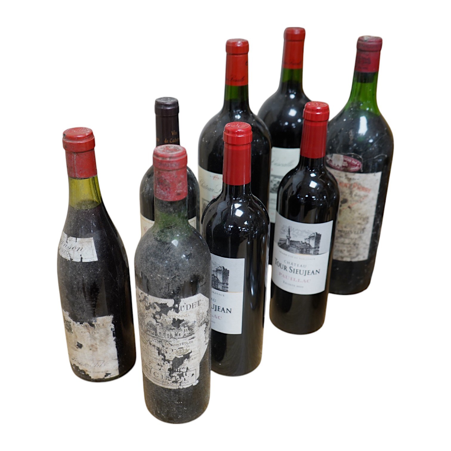 Eight bottles of French wine to include two bottles of Chateau Tour Sieujean 2010, one bottle of Chateau Saint Pierre 1978 and two bottles of Chateau Lescalle 2008. Condition - good, storage history unknown